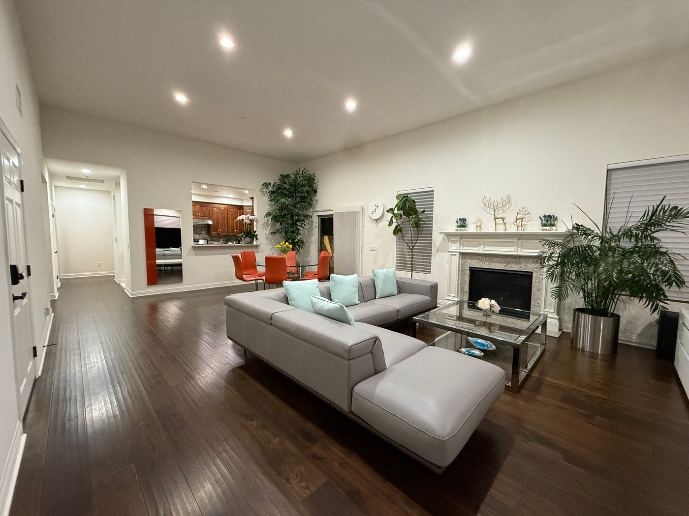 A clean, light-filled living room with modern furnishings.